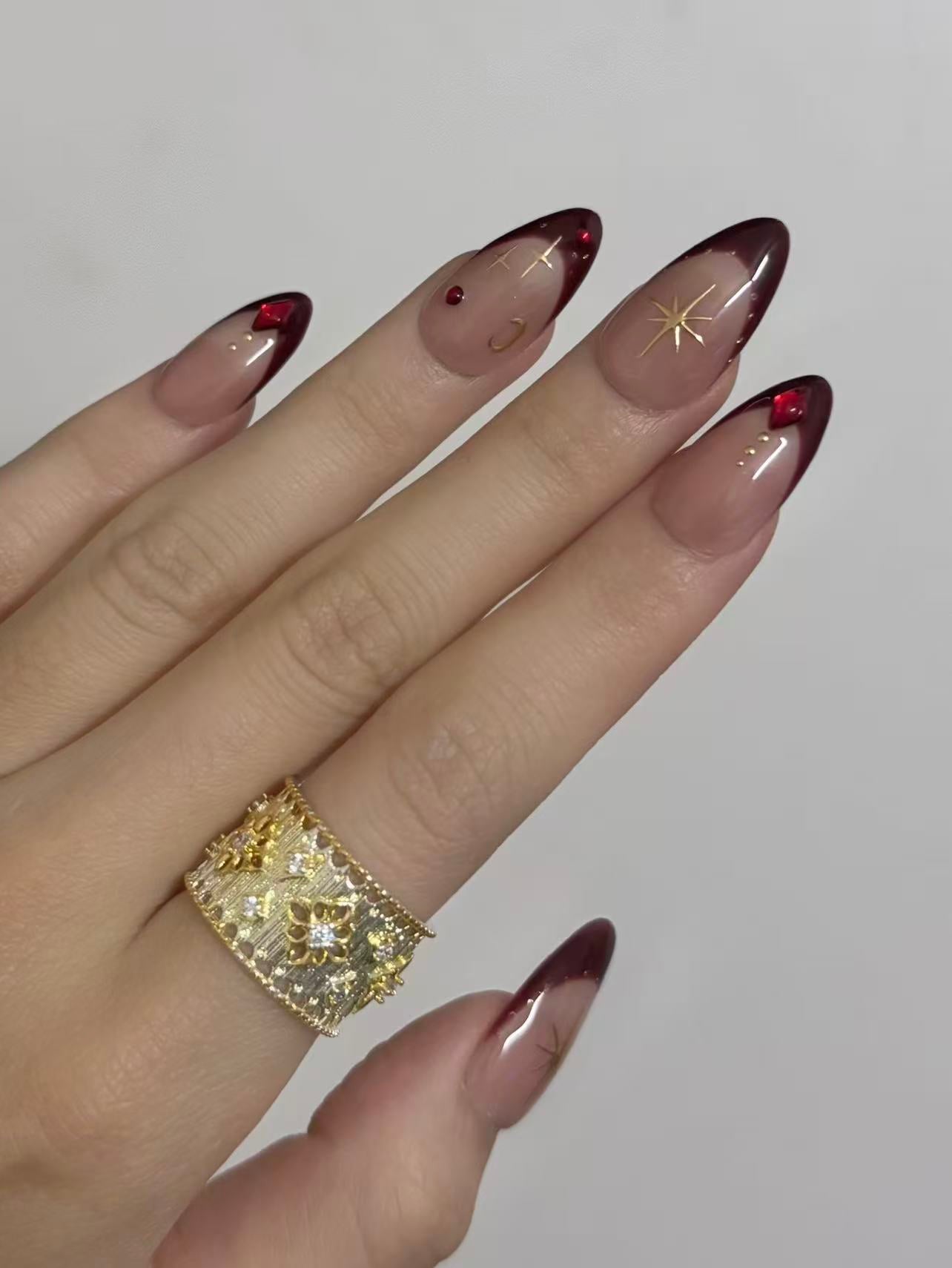 Burgundy French Almond Nails with Gold Accents