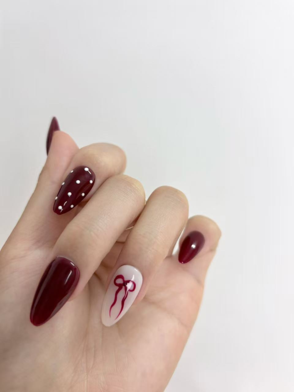 Burgundy Ribbon & Polka Dot Almond Press-On Nails – Elegant Festive Design